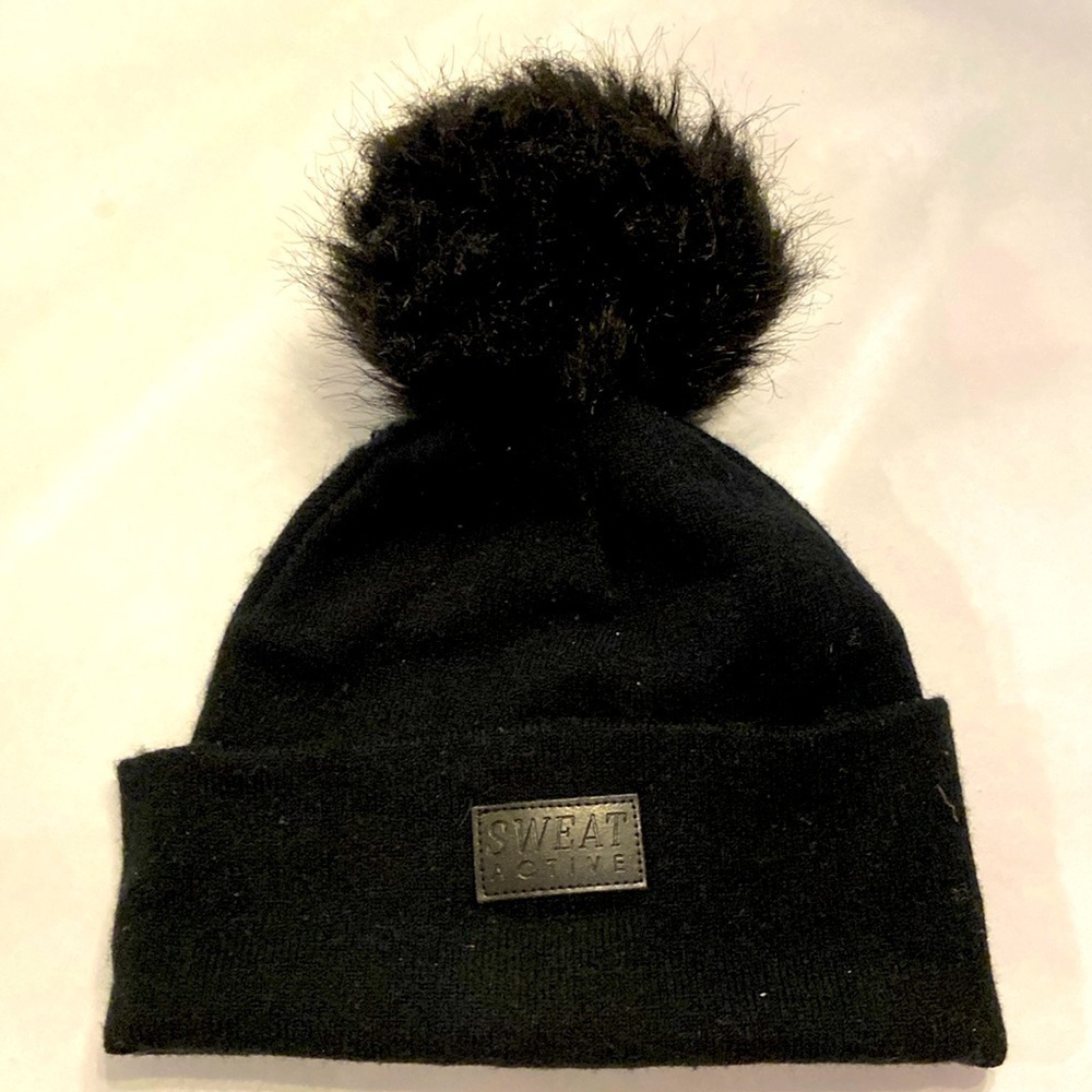 Black winter hat with Pompom, purchased from CycleBar
